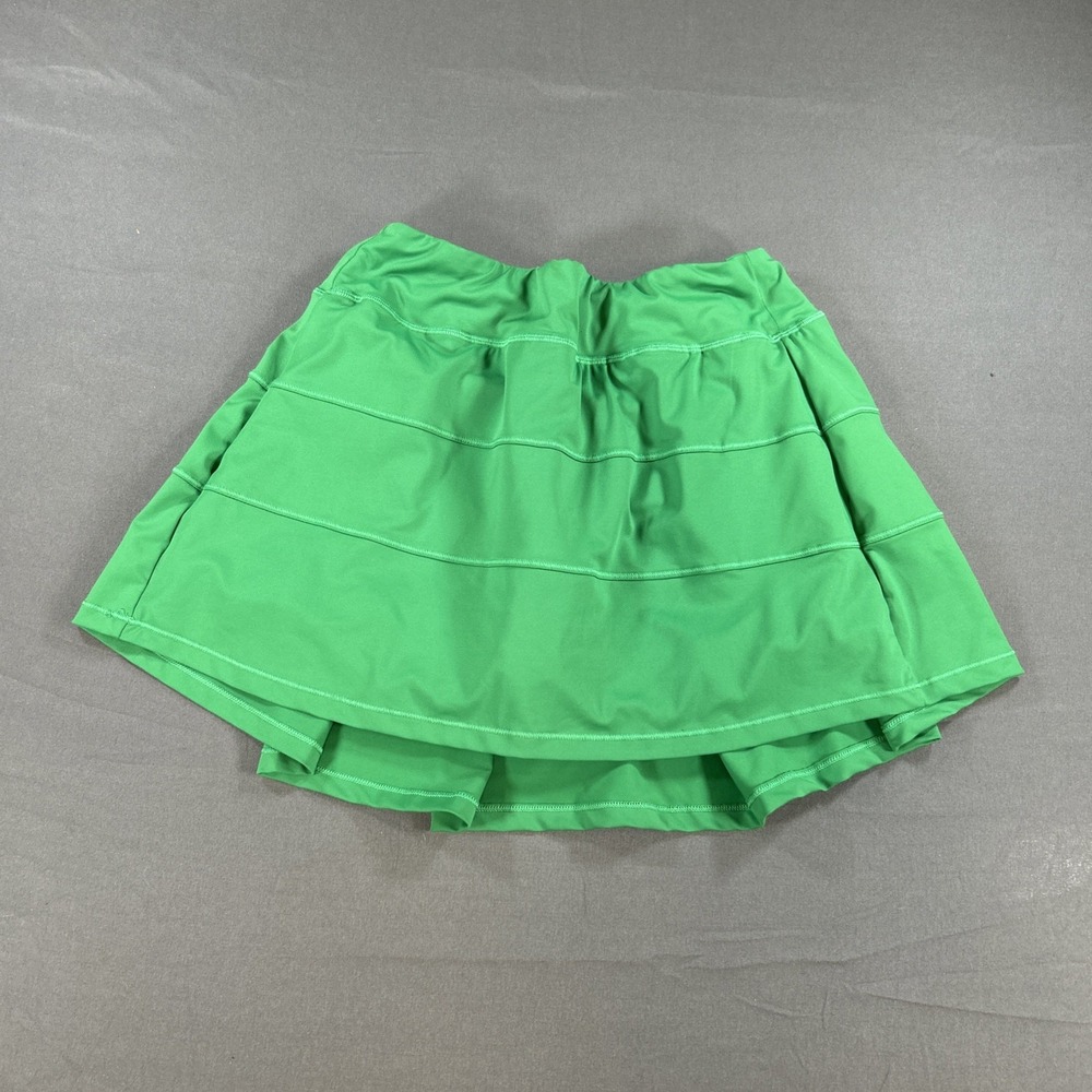 tiered flare design and a built-in short liner with drop-in pockets Size 6